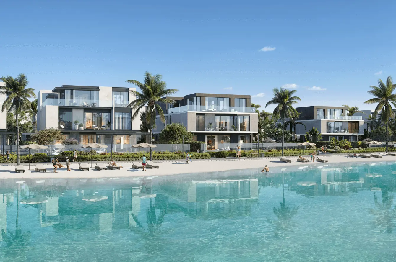 Crystal lagoon with a sandy beach and beautiful parks